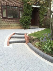 new front drive with stairs, brickwork