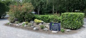 New driveway with middle feature and company sign - landscapes essex